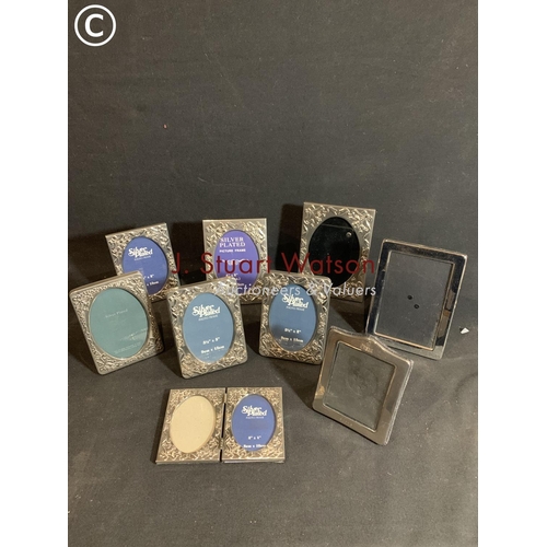 594 - 9 silver plated photo frames