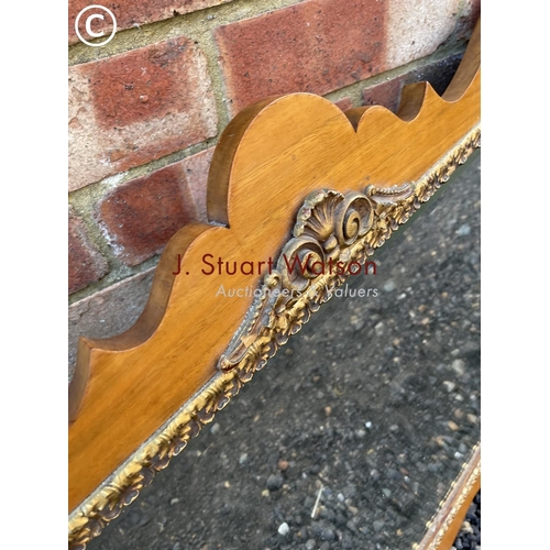 60 - A mahogany and gilt framed mirror