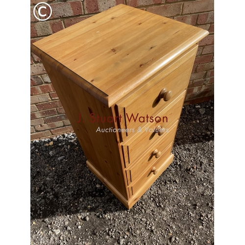 62 - A solid pine chest of four drawers