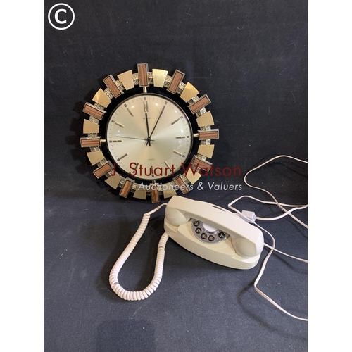 625 - Wall clock and trim phone