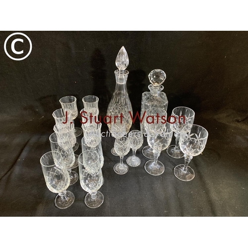 627 - 2 cut glass decanters and drinking glasses