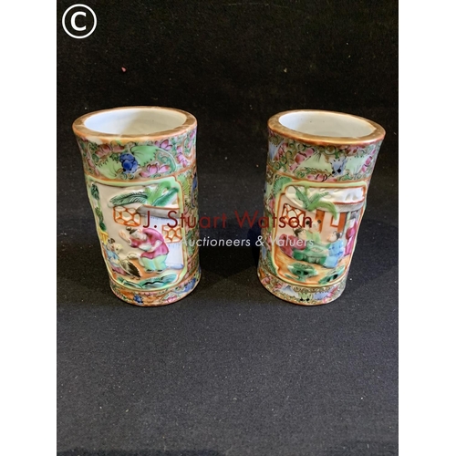 666 - Pair of Canton Famille Rose pierced spill vases, height 11 cms