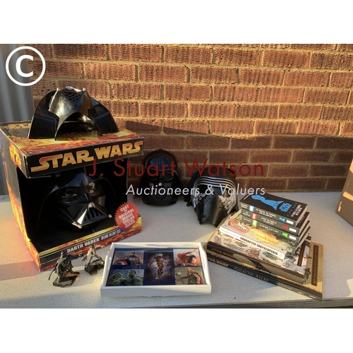 693 - 3 Star Wars masks, boxed helmet, books and figures