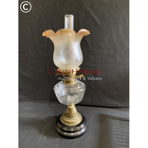 706 - Cut glass oil lamp and shade overall height 57 cms