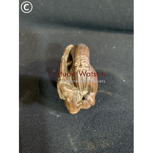 724 - Carved hardwood netsuke of old man height