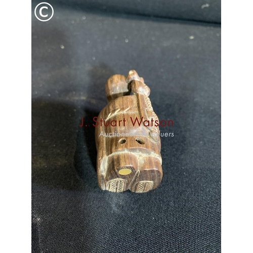 724 - Carved hardwood netsuke of old man height