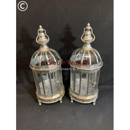 744 - Pair of decorative large silver coloured candle lanterns each height 60 cms