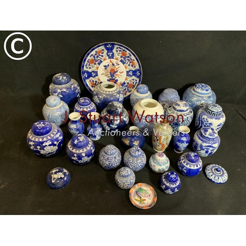 750 - Collection of blue and white ginger jars, vases and wall plate