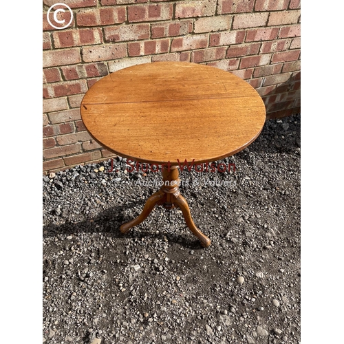 76 - A mahogany tripod occasional table