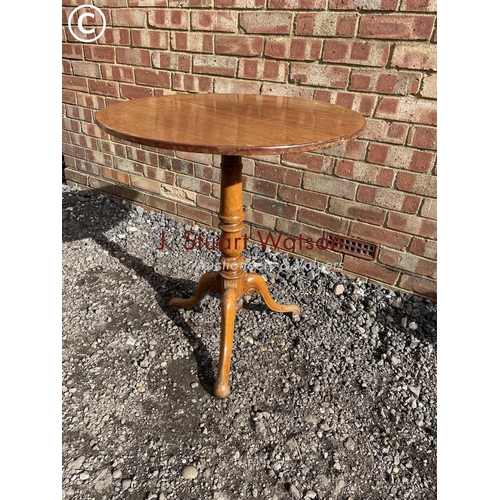 76 - A mahogany tripod occasional table