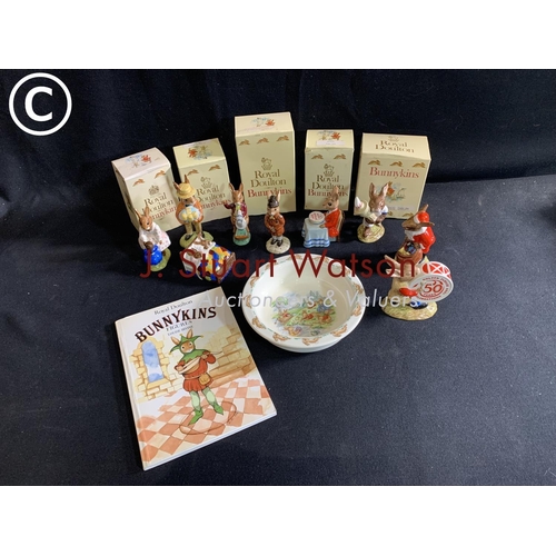 766 - Nine Doulton Bunnykins figures, bowl and booklet