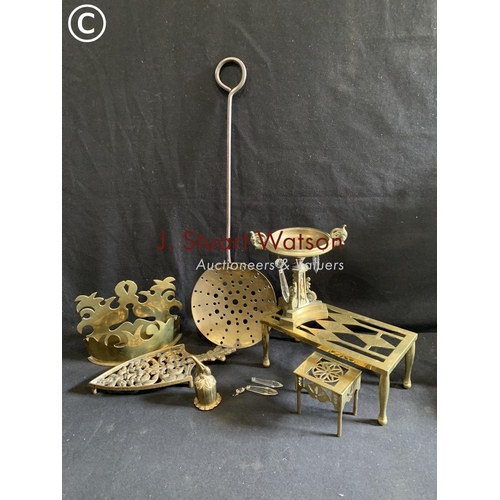 770 - Brass trivets, skimmer and small bronze Tazza