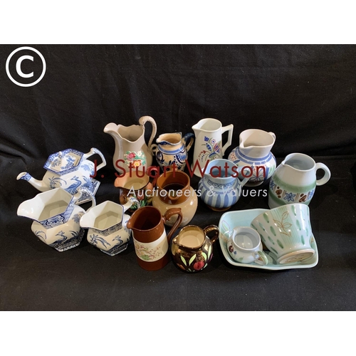 775 - Wood & Son Yuan Teapot & stand with two jugs, collection of jugs and Buchan pottery ware