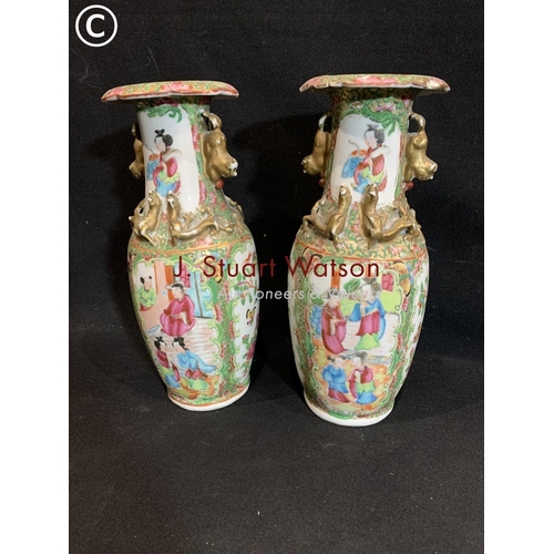 817 - Pair of 19th Century Canton Famille Rose Vases height 24 cms, one a/f on rim (repaired)