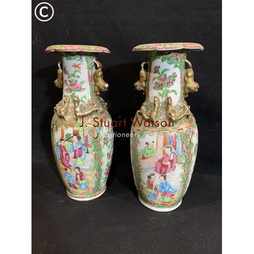 817 - Pair of 19th Century Canton Famille Rose Vases height 24 cms, one a/f on rim (repaired)