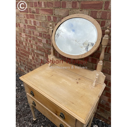 84 - A pine dressing chest of two drawers