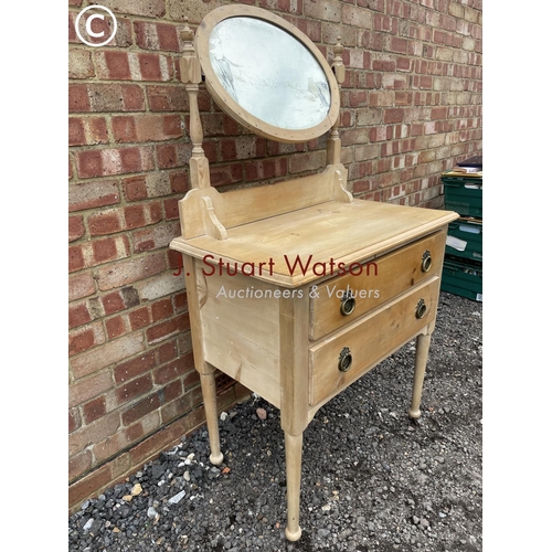 84 - A pine dressing chest of two drawers