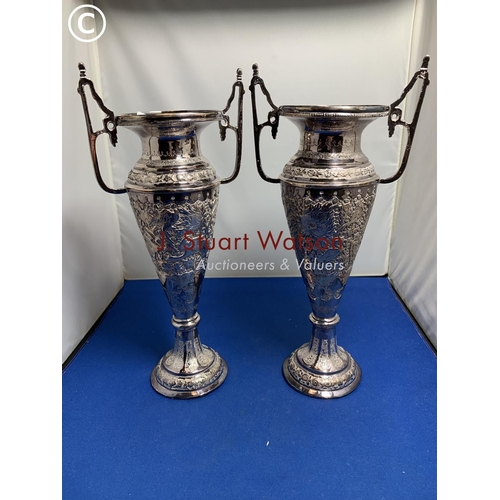 859 - Impressive pair of Indian Silver two handled vases each height 29 cms, total weight 27.5 ozt.