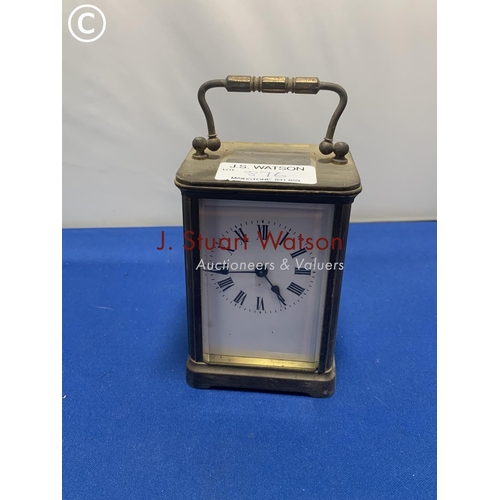 876 - Brass carriage clock (no damage to glass, ticks)