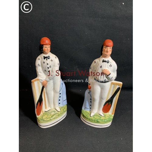 946 - Pair of reproduction Staffordshire Cricketer figures height 26 cms