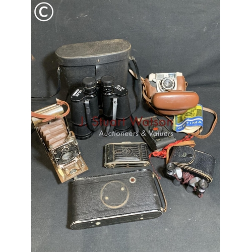 957 - Compur folding camera and four others and two pairs of Binoculars