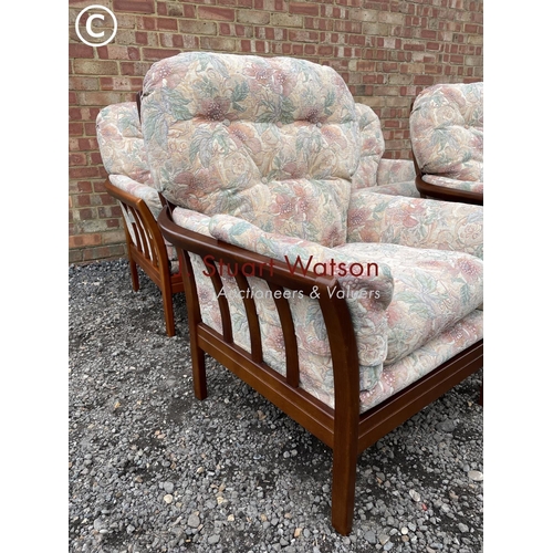 96 - A teak framed three piece lounge suite by cintique