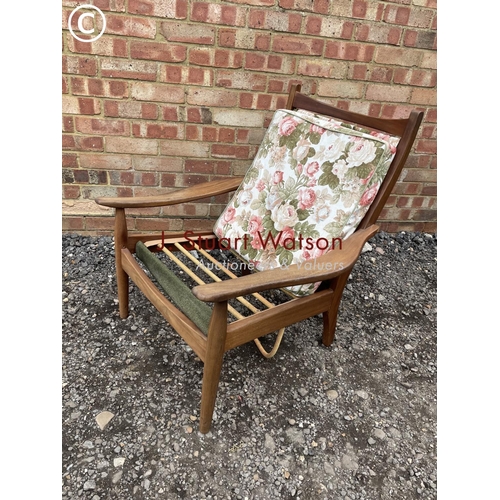 98 - A mid century teak framed lounger chair