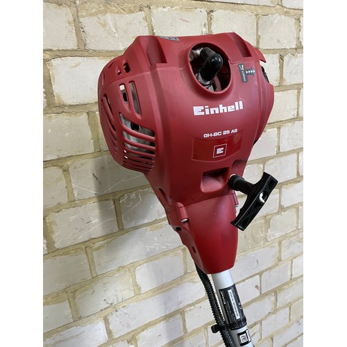 252 - An einhall petrol strimmer with 2 stroke oil in as new condition