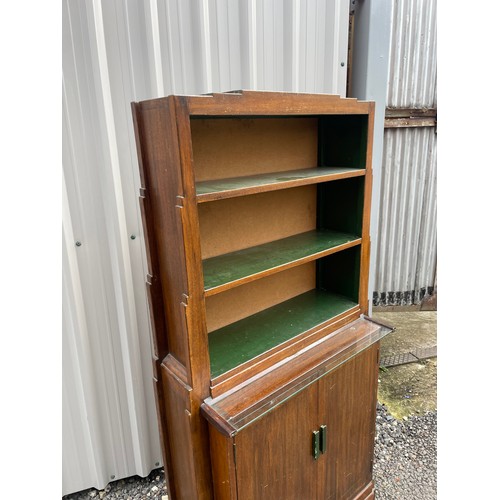 379 - A mid century oak bookcase cupboard