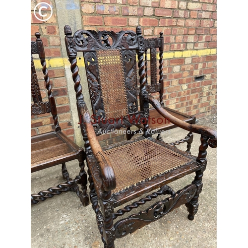 210 - A carved oak carver chair with bergere seat together with a pair of barley twist oak dining chairs