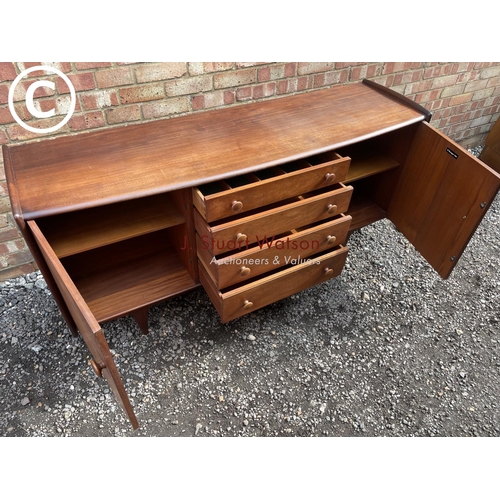 1 - A  Mid century teak sideboard labelled A Younger