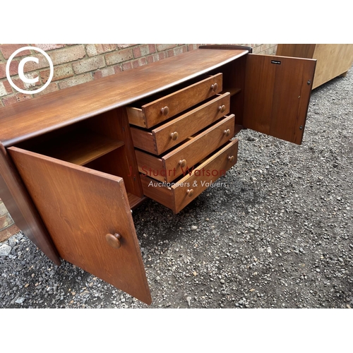 1 - A  Mid century teak sideboard labelled A Younger