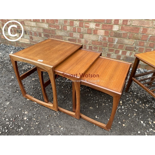 117 - A g plan teak nest of three tables together with a danish style coffee table