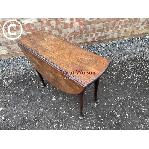 132 - A Georgian mahogany pad foot table