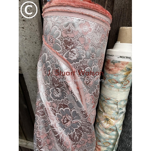 143 - Three rolls of patterned material