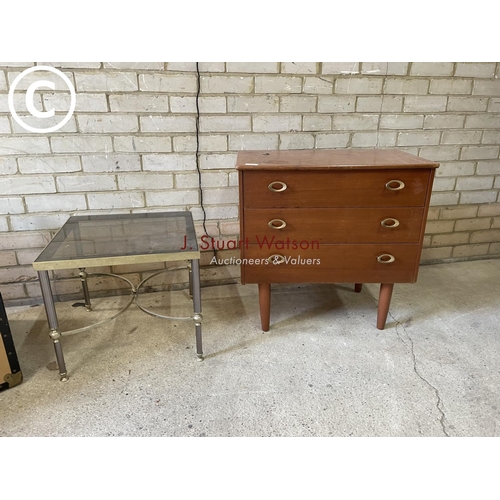 148 - A teak chest of three together with a brass and glass side table