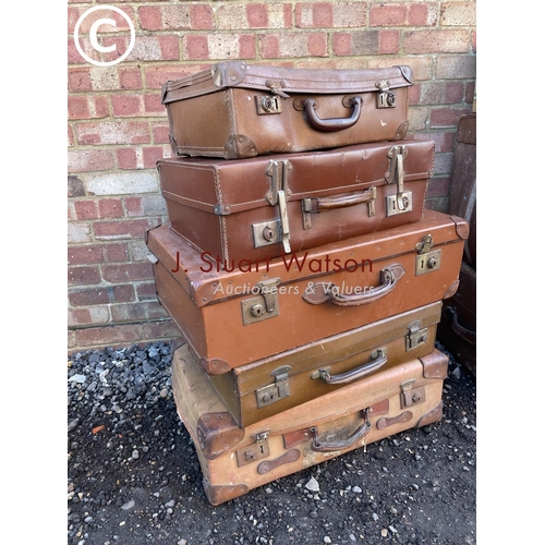 152 - Five vintage suitcases