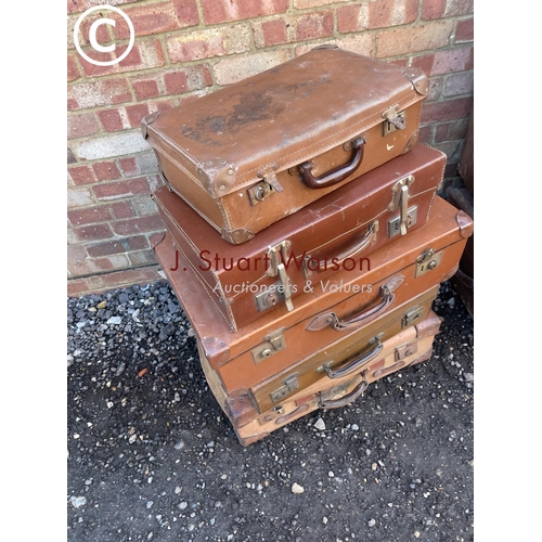 152 - Five vintage suitcases