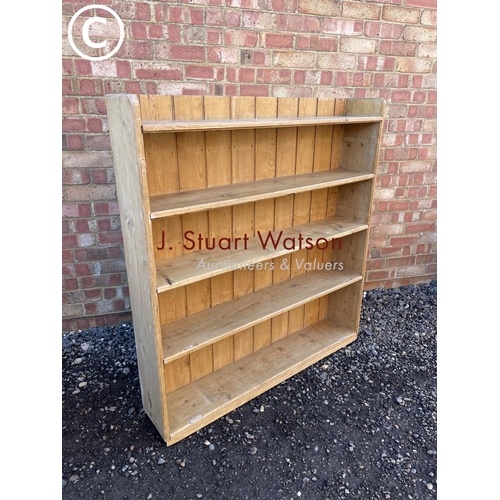 155 - An open fronted farmhouse pine bookcase 110x23x120