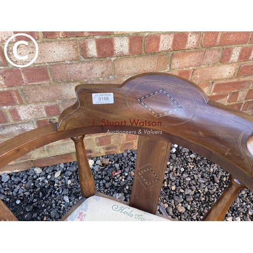 158 - An Edwardian inlaid bow back salon chair together with another chair