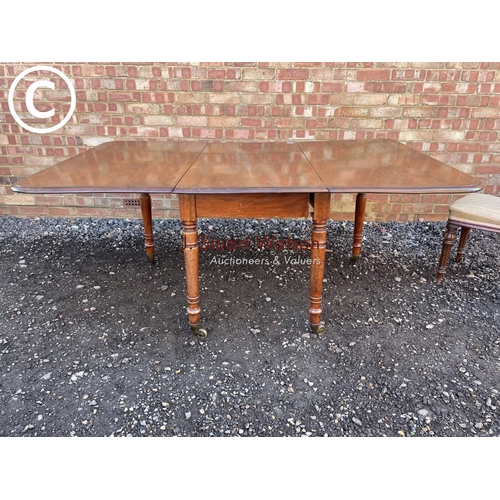 162 - A  Victorian mahogany drop leaf table together with four balloon back chairs 180x110x70