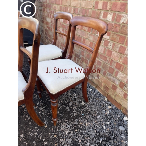 180 - A set of four mahogany bar back dining chairs