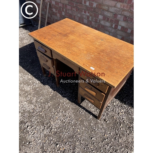 193 - A 20t century oak office desk 126x58