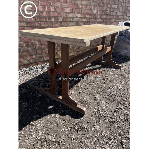 222 - An oak based twin stretcher refectory style table with pine top 183x66x70