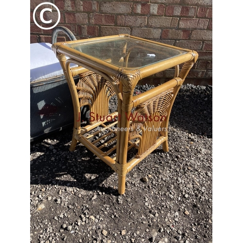 223 - A loom style ottoman together with a bamboo side table