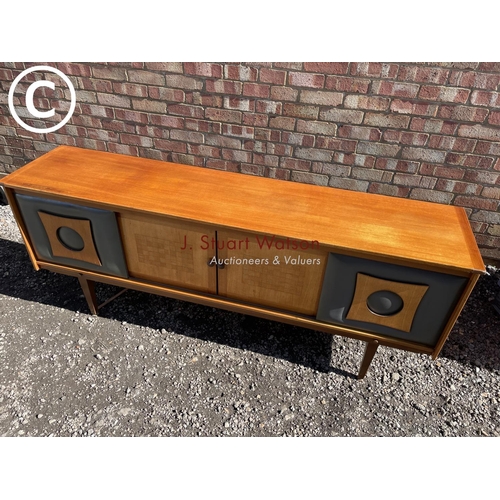 224 - A  Mid century teak sideboard with vinyl fronted sliding doors 183 wide