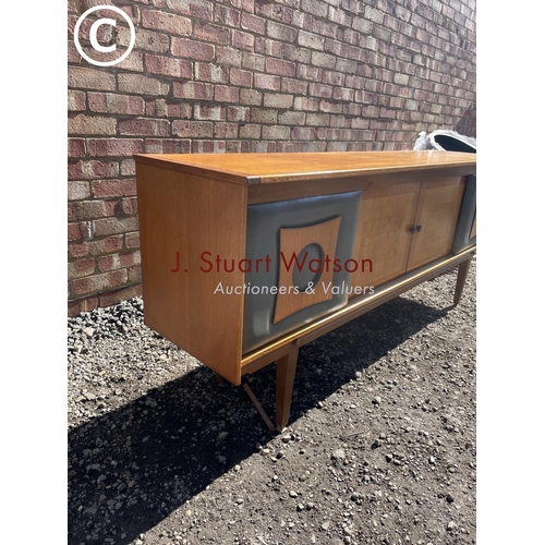 224 - A  Mid century teak sideboard with vinyl fronted sliding doors 183 wide