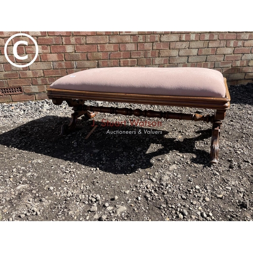 234 - A large mahogany x frame footstool 107x58x40