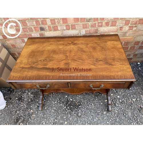 269 - A reproduction mahogany two drawer sofa table