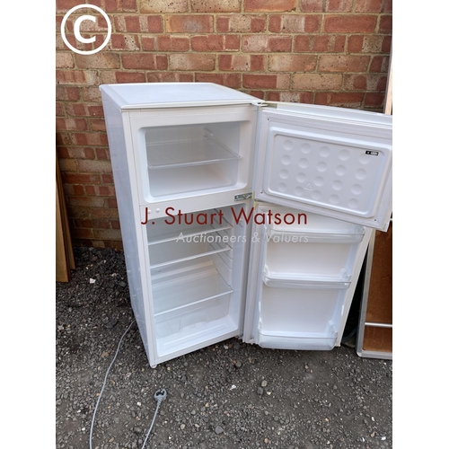 272 - A modern compact size fridge freezer